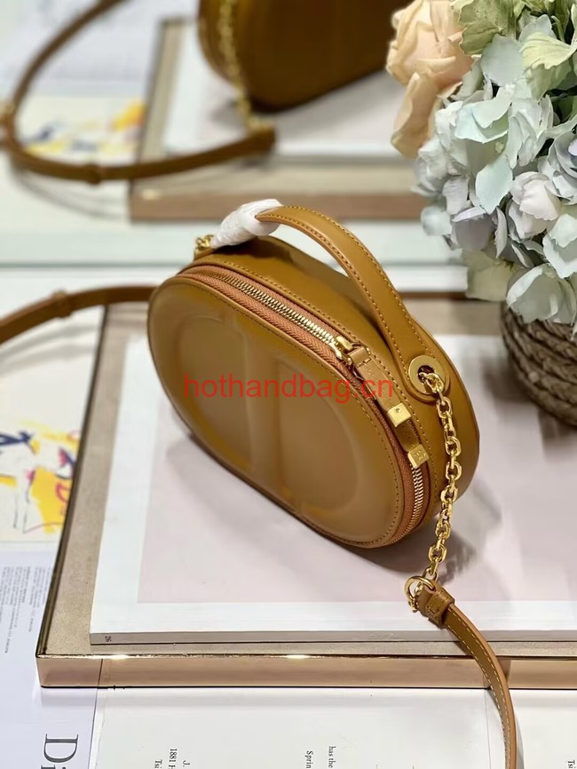 CD SIGNATURE OVAL CAMERA BAG Golden Saddle Calfskin with Embossed CD Signature S2201UMFV