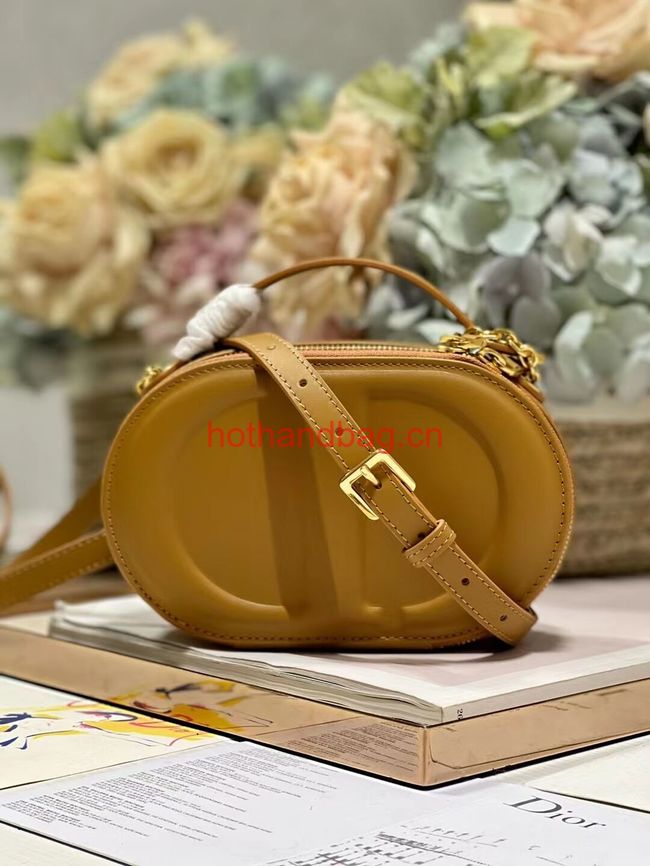 CD SIGNATURE OVAL CAMERA BAG Golden Saddle Calfskin with Embossed CD Signature S2201UMFV