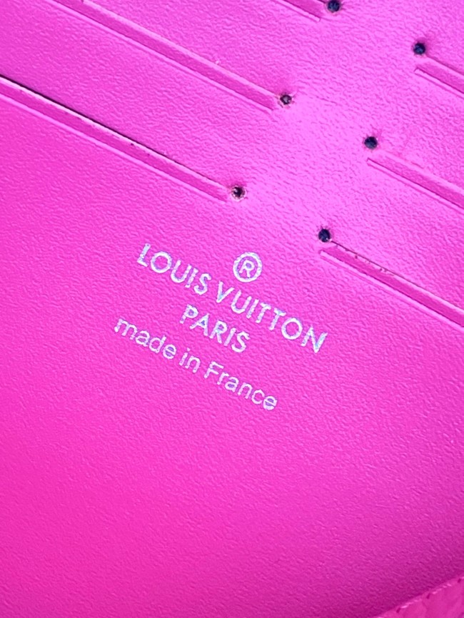 Louis Vuitton Pochette Voyage Monogram embossed cowhide leather MM M61692 Fuchsia